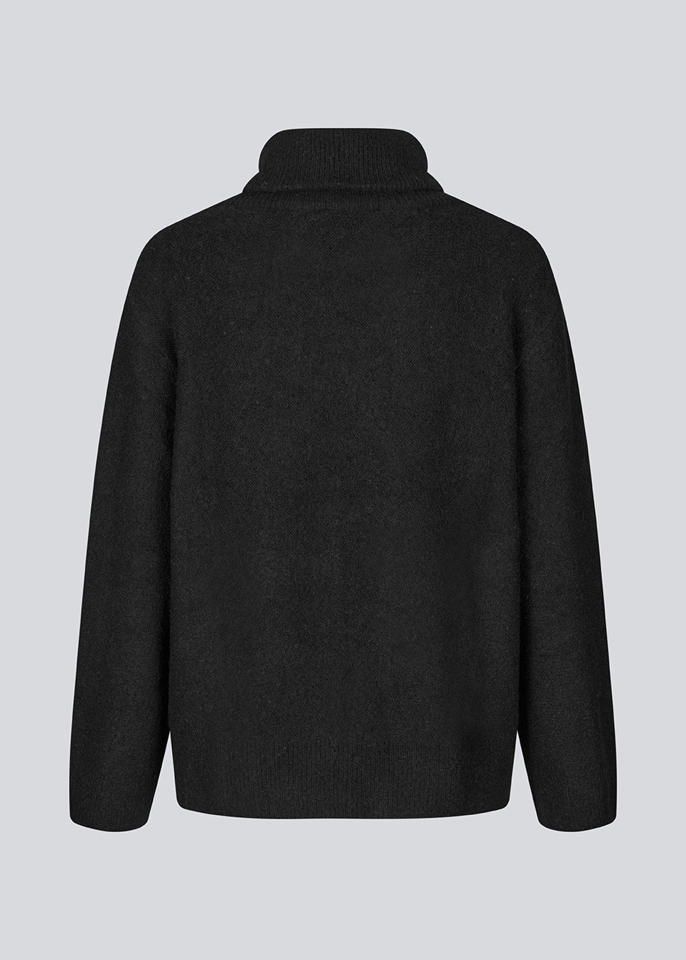 Black knitted jumper in wool and llama wool mix. AdrianMD t-neck has a relaxed fit with dropped shoulder, rib-knitted rollneck and trimmings.